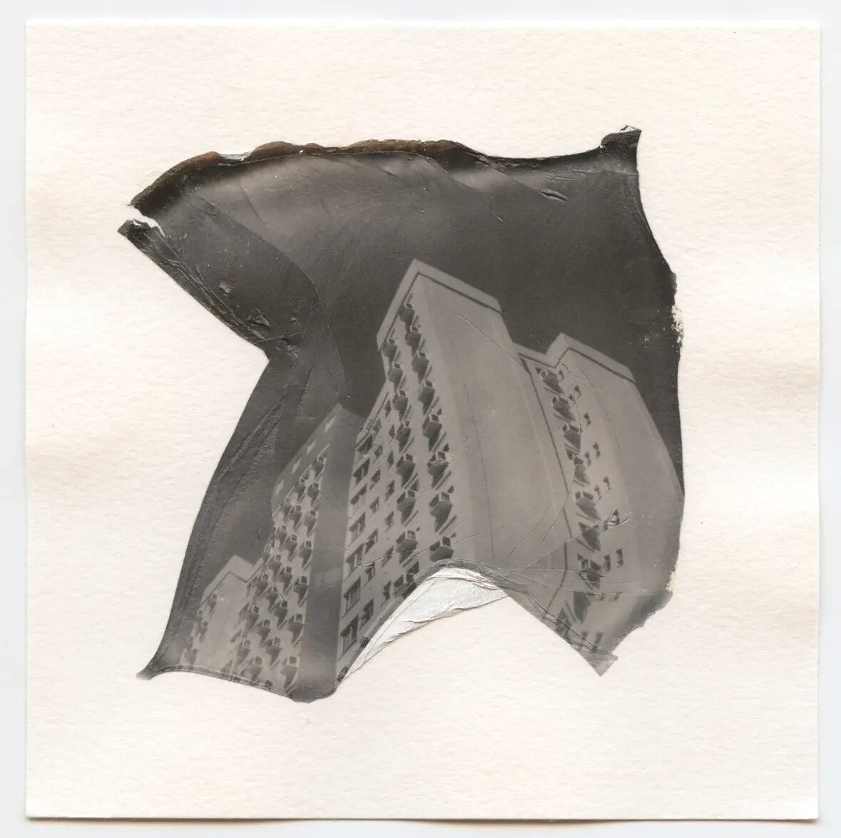 Two monochrome Polaroid emulsion transfers with architectural forms